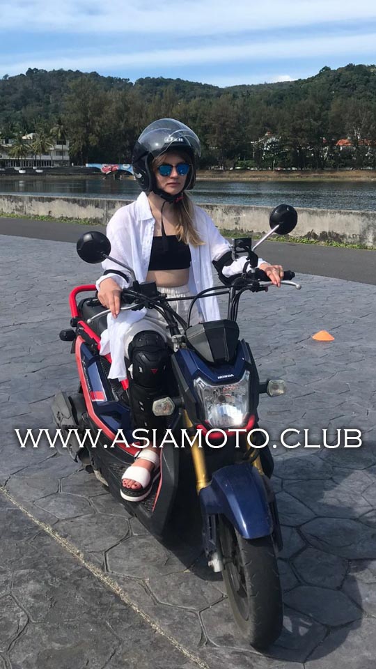 Motorcycle helmet and motorbike. Motorcycle safety. Samui